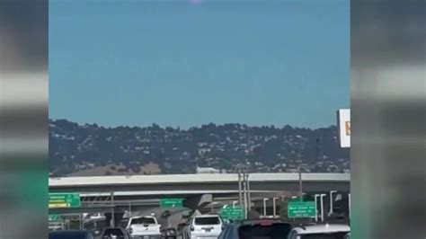 Video shows naked woman running with a gun on Bay Bridge